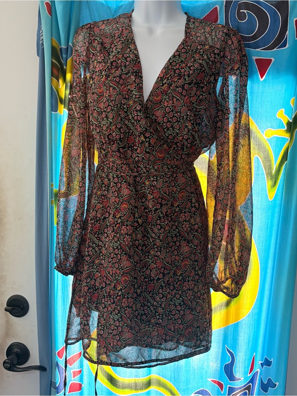 Urban Outfitters Sheer Floral Paisley.
Wrap Mini Dress Medium